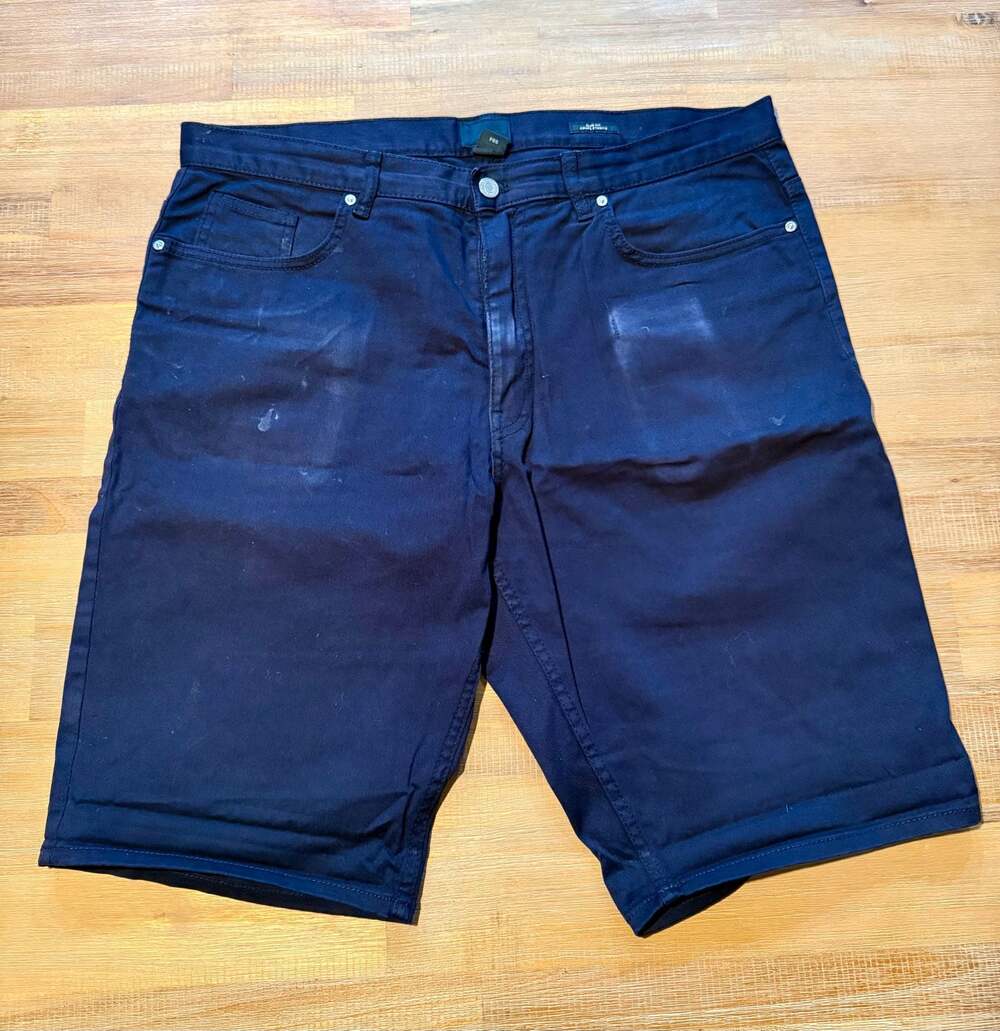 Slim-fit denim bermuda shorts - Men